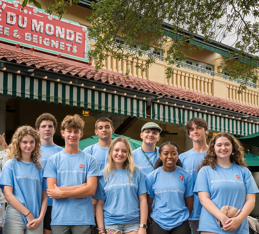 Students enjoy beignets and cafe au laits at Cafe du Monde.