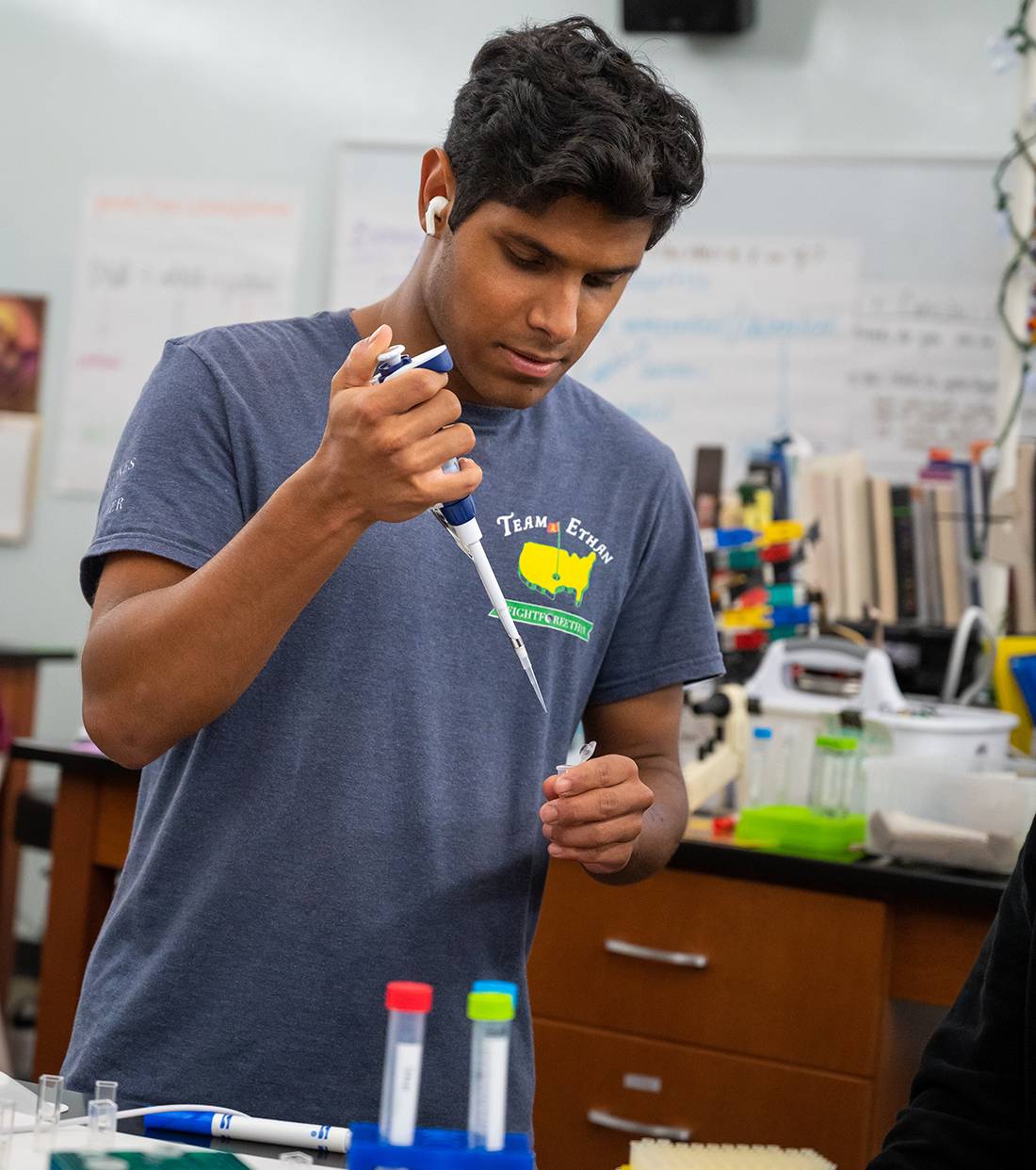 A student works in the lab in the Intro to Human Metabolism course.