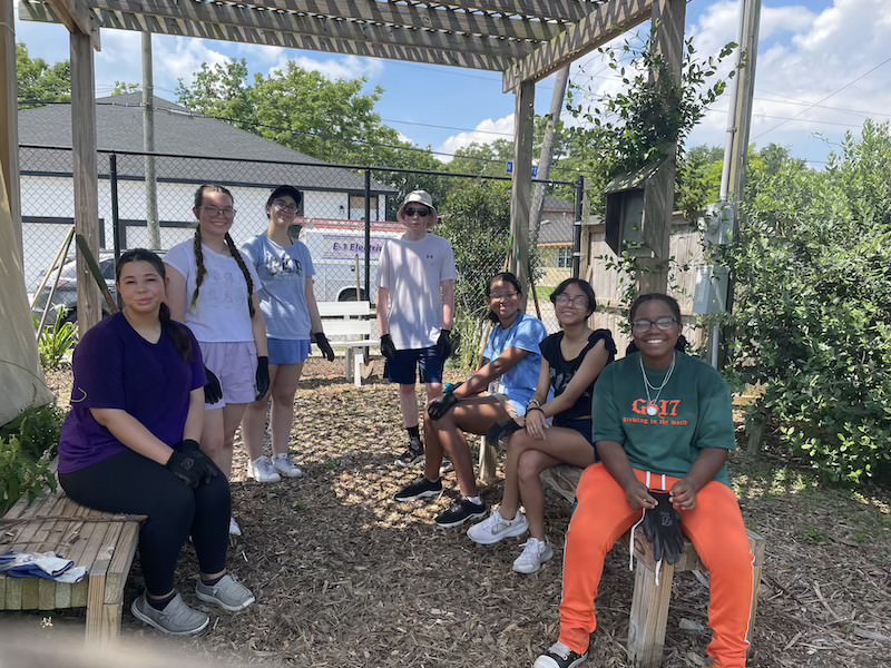 Students doing a Service Learning Project at a Local Garden